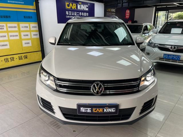 Volkswagen Tiguan 2015 2.0TSI Автоматическая полноприводная флагманская версия экстерьер фото 2 Volkswagen Tiguan 2015 2.0TSI Автоматическая полноприводная флагманская версия экстерьер фото 2