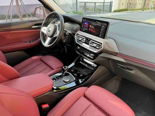 BMW X3 2022 xDrive30i Leading Type M Obsidian Night Suit interior photo 11