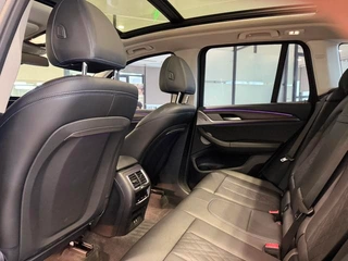 BMW X3 2023 xDrive30i Лидирующий M Ночной костюм интерьер фото 14