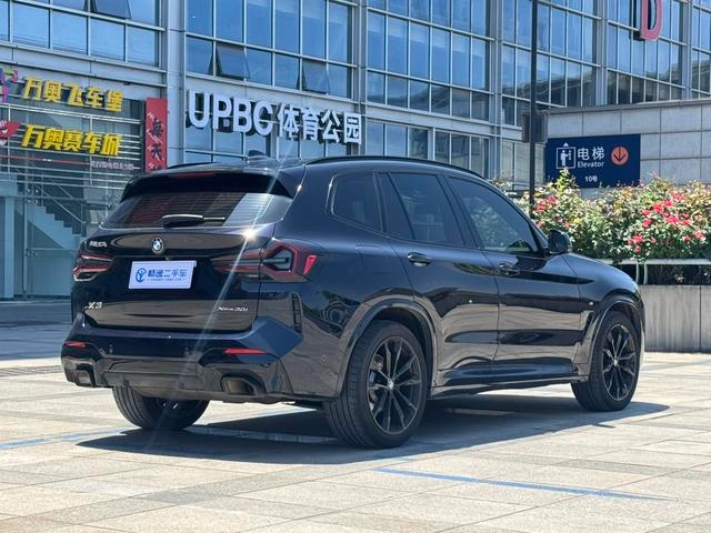 BMW X3 2022 xDrive30i Premium Class M Obsidian Night Suit exterior photo 3