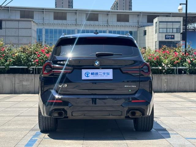 BMW X3 2022 xDrive30i Premium Class M Obsidian Night Suit exterior photo 4