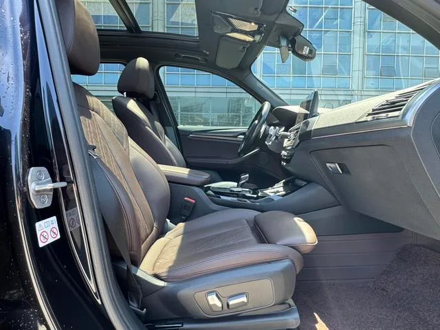 BMW X3 2022 xDrive30i Premium Class M Obsidian Night Suit interior photo 12