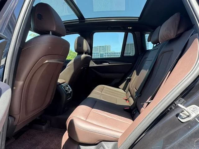 BMW X3 2022 xDrive30i Premium Class M Obsidian Night Suit interior photo 13