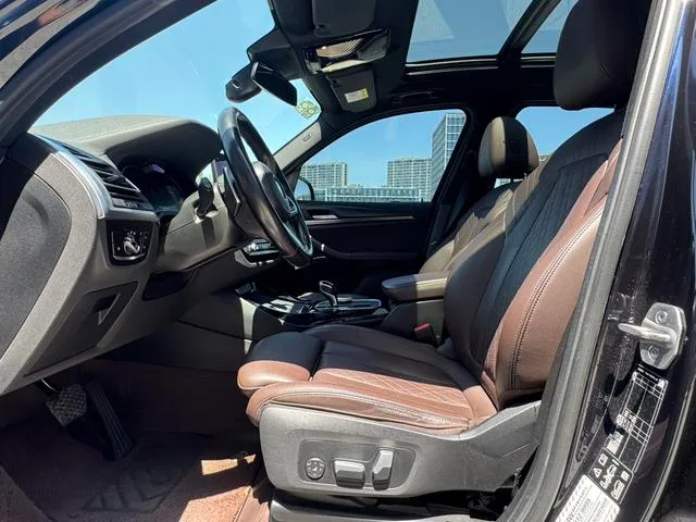 BMW X3 2022 xDrive30i Premium Class M Obsidian Night Suit interior photo 14