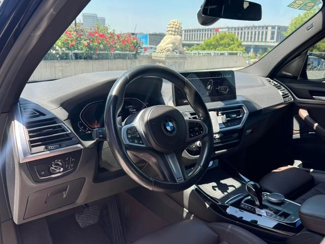 BMW X3 2022 xDrive30i Premium Class M Obsidian Night Suit interior photo 15