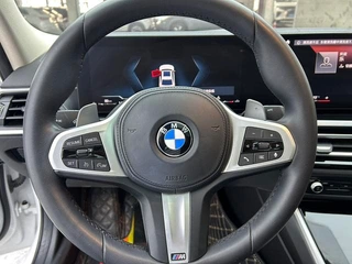BMW 3 Series 2023 320Li M Спортивный костюм интерьер фото 11