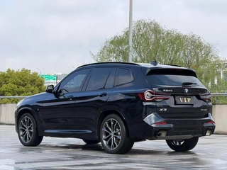 BMW X3 2023 xDrive30i Leading Type M Obsidian Night Suit interior photo 9