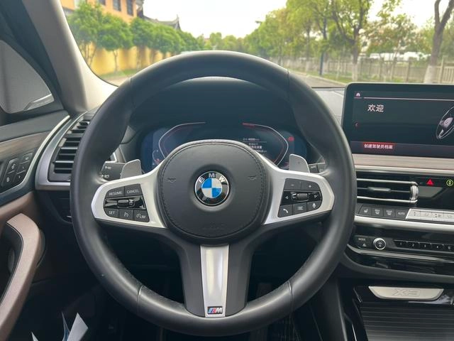 BMW X3 2022 xDrive30i Leading Type M Obsidian Night Suit interior photo 10