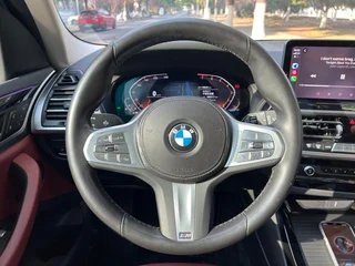 BMW X3 2022 xDrive25i M Sports suit interior photo 16