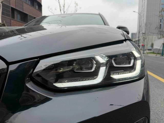 BMW X3 2022 xDrive30i Premium Class M Obsidian Night Suit exterior photo 3