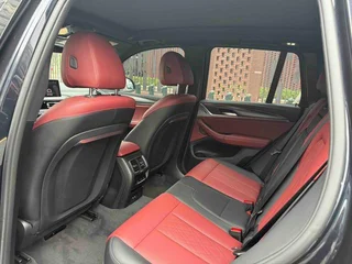 BMW X3 2022 xDrive30i Premium Class M Obsidian Night Suit interior photo 15