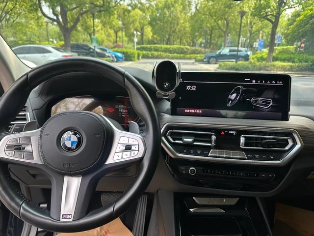BMW X3 2023 xDrive30i Лидирующий M Ночной костюм интерьер фото 12