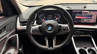 BMW X1 2023 sDrive25Li M Спортивный костюм интерьер фото 7