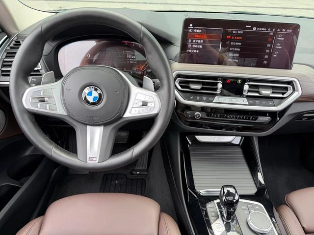 BMW X3 2022 Вторичная модификация xDrive30i Лидирующий M Ночной костюм экстерьер фото 9