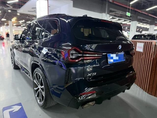 BMW X3 2022 xDrive30i Premium Class M Obsidian Night Suit interior photo 7