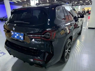 BMW X3 2022 xDrive30i Premium Class M Obsidian Night Suit interior photo 9