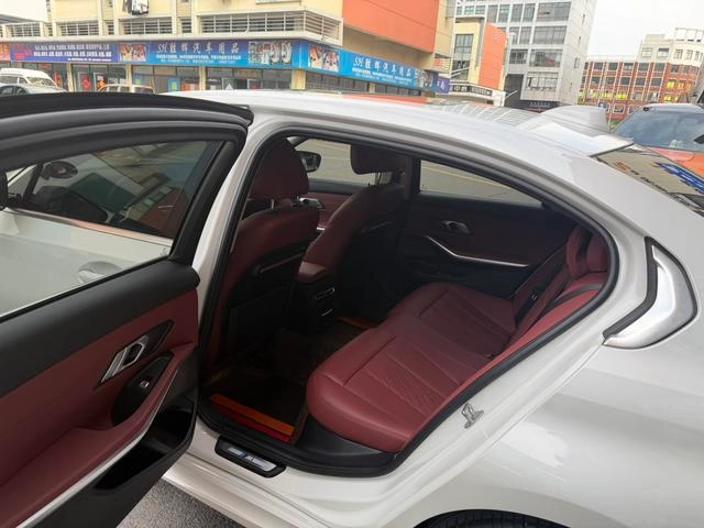 BMW 3 Series 2022 325Li M Спортивный костюм интерьер фото 13
