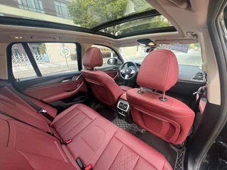 BMW X3 2023 xDrive30i Leading Type M Obsidian Night Suit interior photo 9