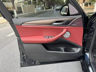 BMW X3 2023 xDrive30i Leading Type M Obsidian Night Suit interior photo 14
