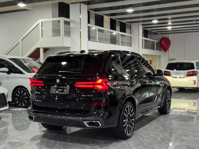 BMW X5 2023 xDrive40Li M Спортивный ночной костюм интерьер фото 15
