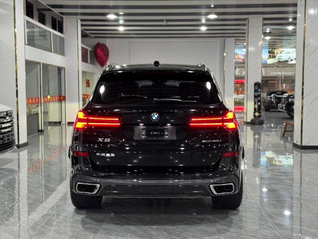BMW X5 2023 xDrive40Li M Спортивный ночной костюм интерьер фото 16