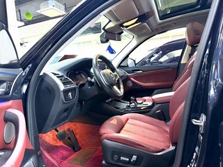 BMW X3 2022 xDrive30i Leading Type M Obsidian Night Suit interior photo 7