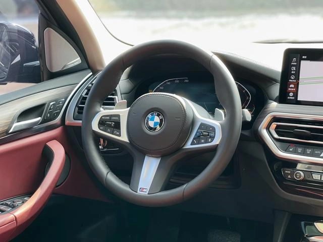 BMW X3 2022 xDrive30i Leading Type M Obsidian Night Suit interior photo 10