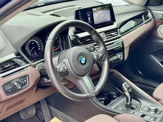 BMW X1 2022 sDrive25Li Лидирующий экстерьер фото 9