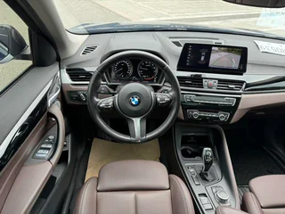 BMW X1 2022 sDrive25Li Лидирующий интерьер фото 14