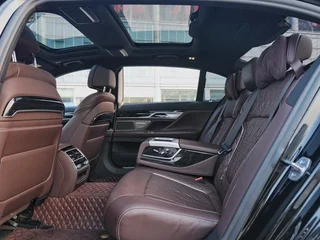 BMW 7 Series 2021 740Li Лидирующий M Спортивный костюм интерьер фото 11