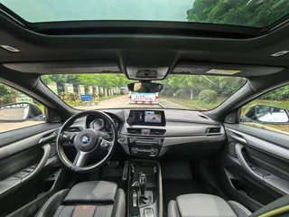 BMW X2 2023 sDrive25i Obsidian Yi Edition interior photo 8