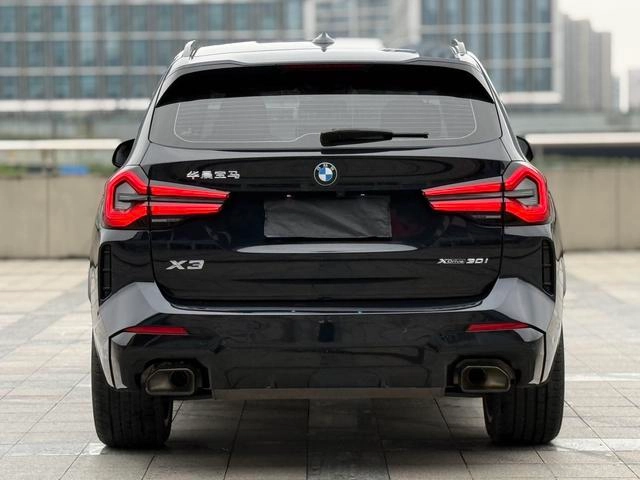 BMW X3 2023 xDrive30i Leading Type M Obsidian Night Suit interior photo 16