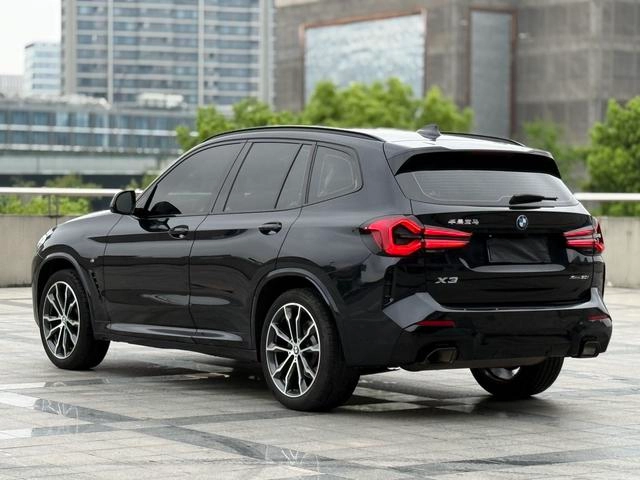 BMW X3 2023 xDrive30i Leading Type M Obsidian Night Suit interior photo 17