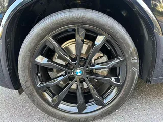 BMW X3 2022 Вторичная модификация xDrive30i Премиум-класса M Ночной костюм интерьер фото 13