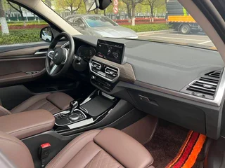 BMW X3 2022 xDrive30i Leading Type M Obsidian Night Suit interior photo 11