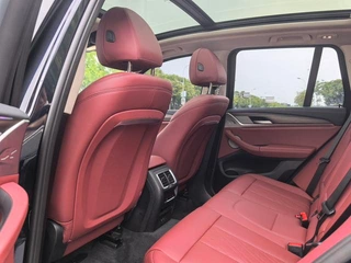 BMW X3 2023 xDrive30i Leading Type M Obsidian Night Suit interior photo 6