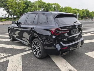 BMW X3 2023 xDrive30i Leading Type M Obsidian Night Suit interior photo 9
