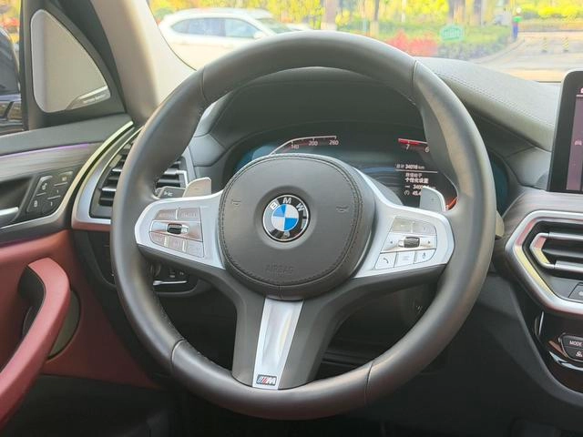 BMW X3 2023 xDrive30i Leading Type M Obsidian Night Suit interior photo 12