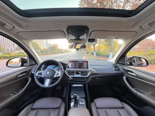BMW X3 2022 xDrive30i Leading Type M Obsidian Night Suit interior photo 10