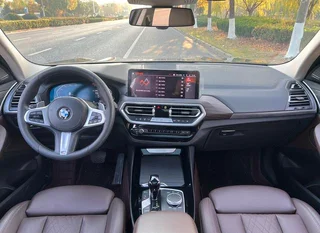 BMW X3 2022 xDrive30i Leading Type M Obsidian Night Suit interior photo 11