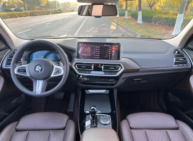 BMW X3 2022 xDrive30i Leading Type M Obsidian Night Suit interior photo 11