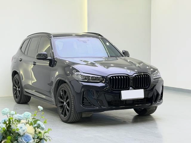 BMW X3 2022 xDrive30i Premium Class M Obsidian Night Suit exterior photo 2