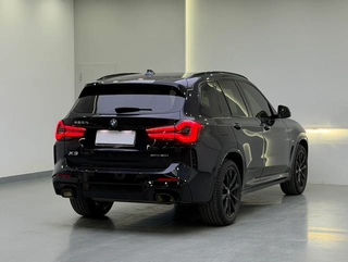 BMW X3 2022 xDrive30i Premium Class M Obsidian Night Suit exterior photo 4