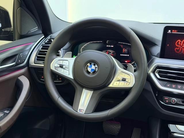 BMW X3 2022 xDrive30i Premium Class M Obsidian Night Suit interior photo 10