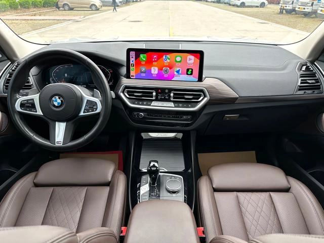 BMW X3 2022 xDrive30i Leading Type M Obsidian Night Suit interior photo 14