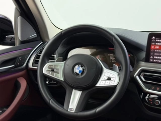BMW X3 2023 xDrive30i Leading Type M Obsidian Night Suit interior photo 12