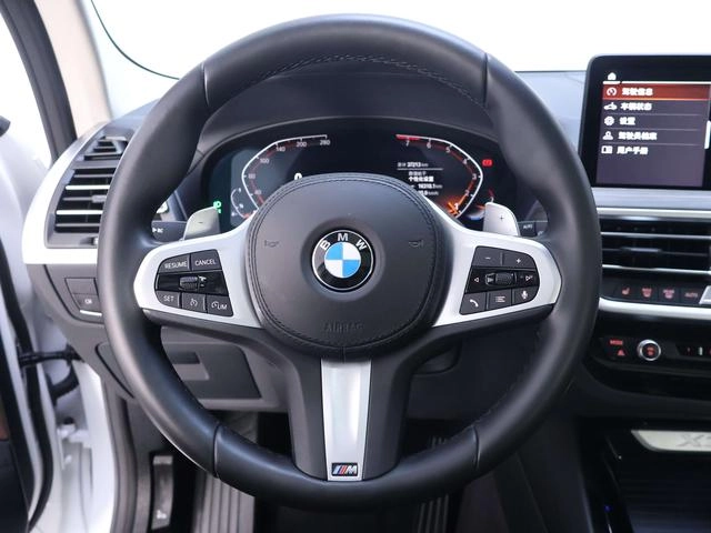 BMW X3 2022 xDrive30i Leading Type M Obsidian Night Suit interior photo 17