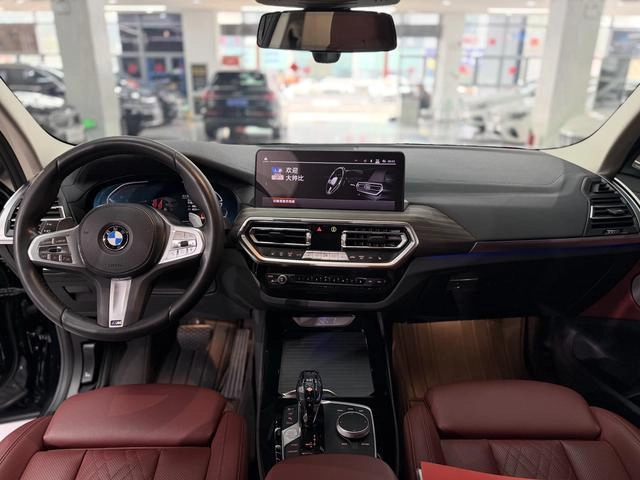 BMW X3 2023 xDrive30i Leading Type M Obsidian Night Suit interior photo 9