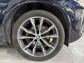 BMW X3 2023 xDrive30i Leading Type M Obsidian Night Suit interior photo 11