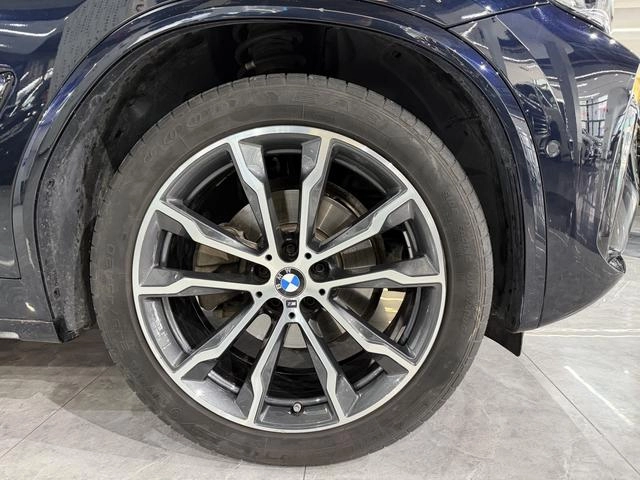 BMW X3 2023 xDrive30i Leading Type M Obsidian Night Suit interior photo 11